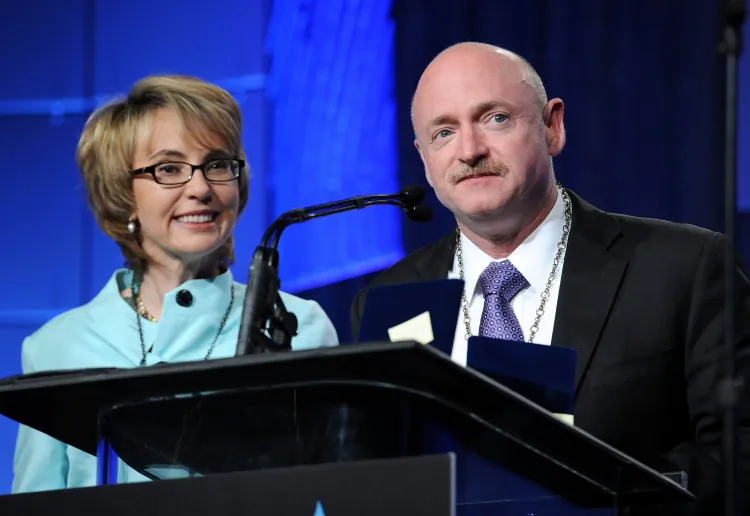 U.S. Congresswoman Gabrielle Giffords and husband astronaut Mark Kelly at an awards event in 2012. Giffords and Kelly launched a campaign to stop gun violence on Jan. 8, 2013, on the anniversary of the Arizona shooting that critically injured Giffords, forcing her to resign as the representative for Arizona's 8th Congressional District. (Valerie Macon/Getty Images)