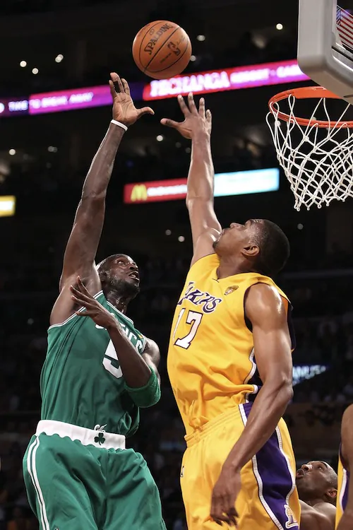 Kevin Garnett (L) and Andrew Bynum (R) each averaged a double-double the past week. (Christian Petersen/Getty Images)
