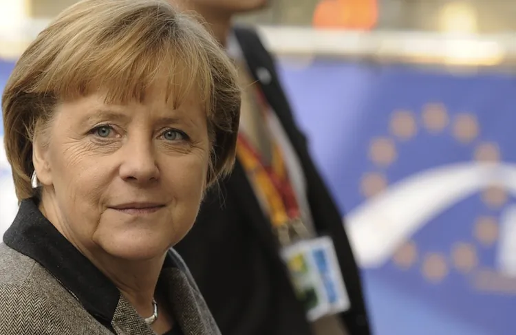 German Chancellor Angela Merkel arrives at the EU Headquarters for a European People's Party (EPP) enlarged summit in Brussels on Dec. 13, 2012. Germany's leading role in handling Europe's debt crisis will give a wider importance to the country's federal elections in 2013. (John Thys/AFP/Getty Images)
