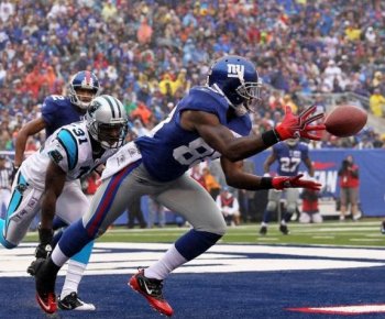 New York Giants wide receiver Hakeem Nicks hauls in one of his three touchdown grabs on Sunday against the Carolina Panthers. (Chris McGrath/Getty Images)