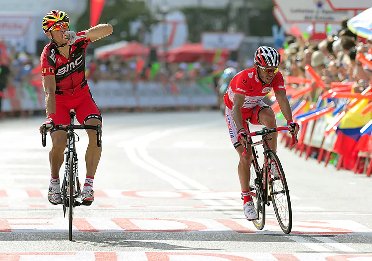 BMC’s Philippe Gilbert (L) crosses the finish line just ahead of race leader Joaquin Rodriguez of Katusha in Stage Nine of the 2012 Vuelta a España. (Lluis Gene/AFP/GettyImages)