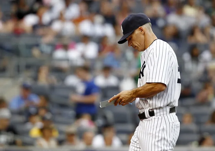 Joe Girardi used eight pitchers against Baltimore Sunday in the loss. (Jeff Zelevansky/Getty Images)