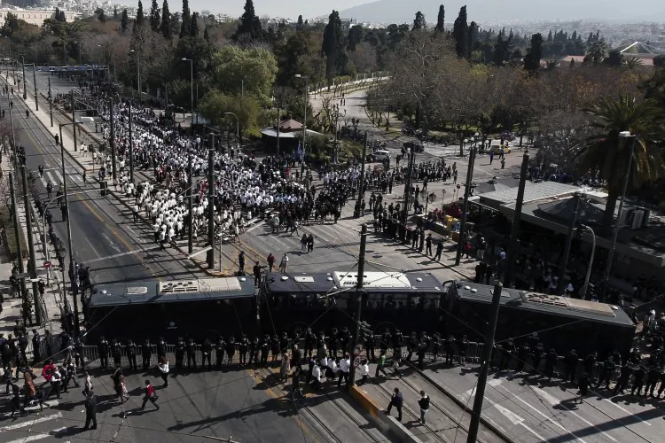 Police block public access to roads on Greek Independence Day in Athens on March 24. Fears of anti-austerity protests prompted an unprecedented security mobilization. (Angelos Tzortzinis /AFP/Getty Images)