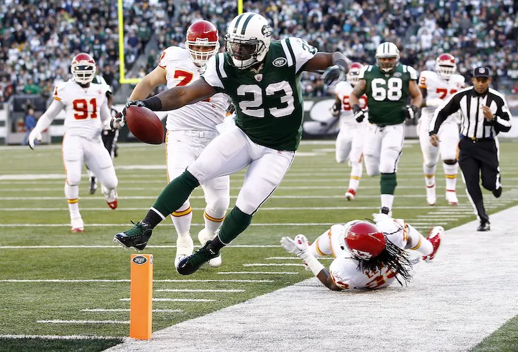 Shonn Greene (23) tries to stay in bounds on this pass play. The third-year running back led the Jets in rushing (129) and receiving yards (58) against the Chiefs. (Jeff Zelevansky/Getty Images)
