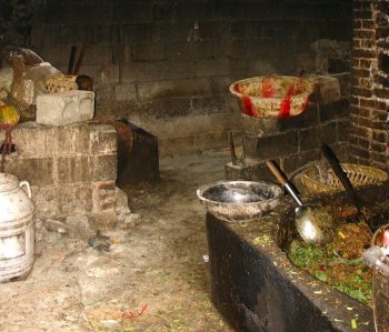Chinese authorities seized 13 barrels of cooking oil made from gutter oil in Tongxin County, Zunyi City, in southwest China's Guizhou Province on Sept. 13. (Epoch Times Photo Archive)