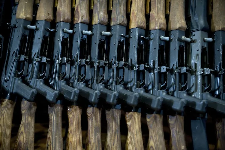 Guns seized in the arrest of Raul Hernandez Lechuga, an alleged member of Los Zetas drug cartel, on display in Mexico City, on Dec. 13, 2011. Not known to be guns of the "Fast and Furious" program. (Ronaldo Schemidt/AFP/Getty Images)