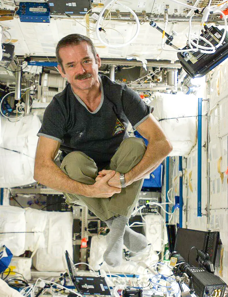 Chris Hadfield tweeted this photo of himself from space on Monday, describing weightlessness as a "constant delight." Hadfield has been tweeting pictures of the sights from space and sharing about his experience.