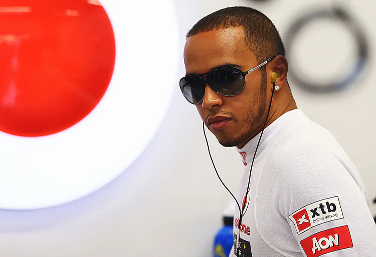 Lewis Hamilton prepares to drive during qualifying for the Formula One Singapore Grand Prix, September 22, 2012. 2012 will be Hamilton’s last season with McLaren. (Robert Cianflone/Getty Images)