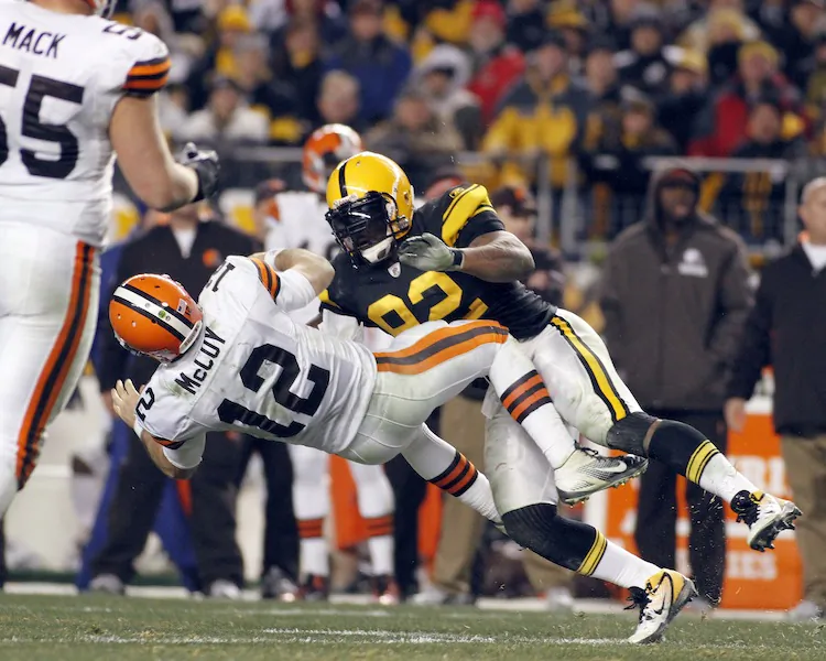 James Harrison (92) has been suspended one game for his hit on McCoy (12). (Justin K. Aller/Getty Images)