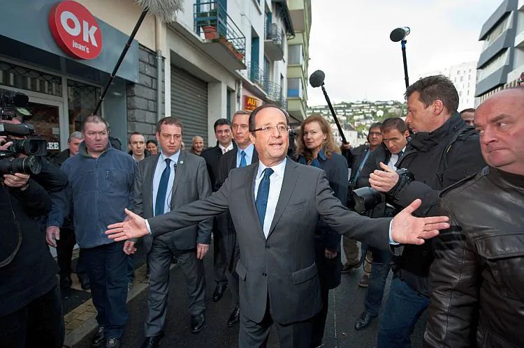 Socialist Party candidate François Hollande leaves the polling office after casting his vote during the first round of the 2012 French presidential election on April 22 in Tulle, France. (Getty Images)
