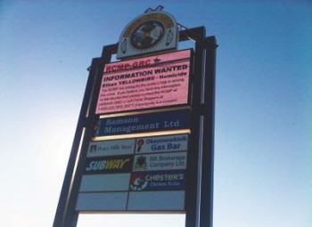 A billboard in Hobbema asks for information on the July 11 shooting death of 5-year-old Ethan Yellowbird. Samson Cree band leaders on the reserve are proposing a bylaw that could evict gang members and criminals from the troubled community. (Justina Reichel/The Epoch Times)