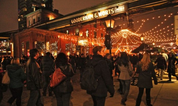 Vendors unveil their merchandise at the annual Toronto Lowe’s Christmas Market at the Distillery District. This year the market aims to attract a record breaking number of carollers. (The McLellan Group)