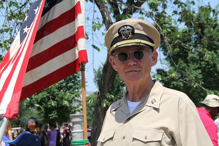 Richard Baldwin, a retired naval officer, was keen to talk about his father who is veteran of World War II, on Memorial Day. (Shar Adams/Epoch Times Staff)