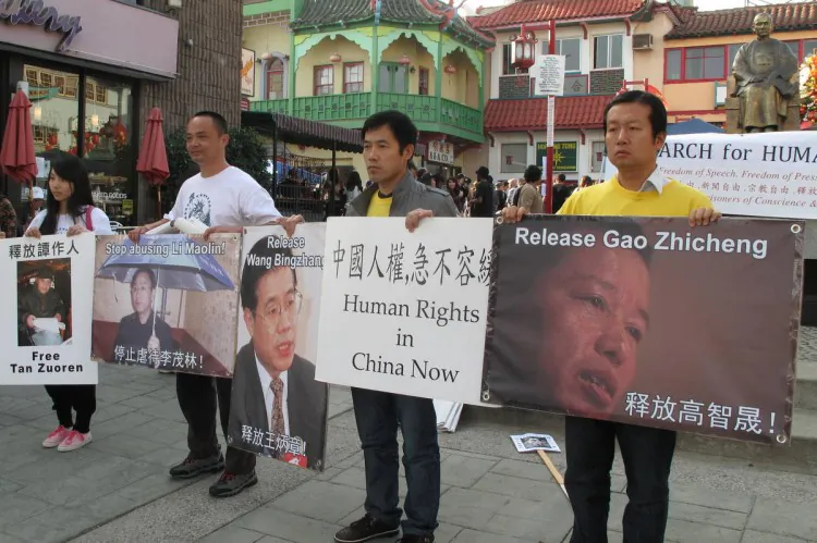 Protesters in Los Angeles called for the release of prisoner of conscience Gao Zhisheng on Dec. 9, the day before Human Rights Day. To the far right is Sun Yong, a member of the Chinese Human Rights Protection Group, and to the left of him is Zhang Jun, a former taxi driver in China who saw the corruption of the regime and now lives in the United States. (Liu Fei/The Epoch Times)