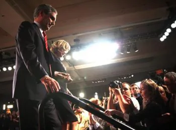 Liberal Leader Michael Ignatieff and wife Zsuzsanna Zsohar leave the stage at the Sheraton Hotel Monday night. Ignatieff lost his own riding in a historic defeat of the Liberal party that will see the NDP form the Official Opposition to Stephen Harper's Tory majority. (Matthew Little/The Epoch Times)
