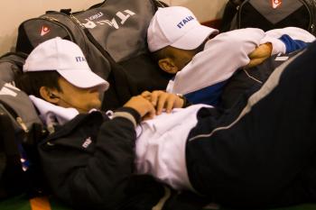 – Two members of the Italian team catch some z's before their match against Canada. Italy won the match 2-1 and placed 9th. (Neil Campbell/The Epoch Times) – Two members of the Italian team catch some z's before their match against Canada. Italy won the match 2-1 and placed 9th. (Neil Campbell/The Epoch Times)