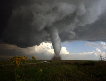 An F2 tornado seen in Colorado. A study by University of Missouri researchers has found that the new niche tourism market of storm-chasing is growing in popularity. (Ron Gravelle) An F2 tornado seen in Colorado. A study by University of Missouri researchers has found that the new niche tourism market of storm-chasing is growing in popularity. (Ron Gravelle)