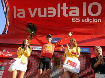 Igor Anton of the Euskaltel-Euskadi team (C) celebrates winning the red jersey at the end of the Stage Nine of the Vuelta a España. He won it back in Stage 11 after losing it in Stage 10. (Jose Jordan/AFP/Getty Images)