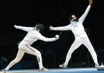 2004 Olympic Games in Athens, Rapier/Women/Finals: (L)Imke Duplitzer (Germany), (R)Oxana Ermakove (Russia), August, 2004. Duplitzer was awarded the silver medal. (Martin Rose/Bongarts/Getty Images) 2004 Olympic Games in Athens, Rapier/Women/Finals: (L)Imke Duplitzer (Germany), (R)Oxana Ermakove (Russia), August, 2004. Duplitzer was awarded the silver medal. (Martin Rose/Bongarts/Getty Images)