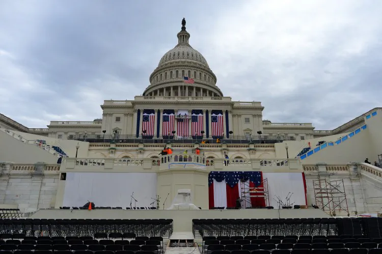 An estimated 1.8 million people gathered at the National Mall during the inaugural ceremony for President Barack Obama in 2009. Numbers are not expected to be as large this year, though hundreds of thousands are expected to descend on the U.S. Capitol for the event on Jan. 21, 2013. (Jewel Samad/AFP/Getty Images)