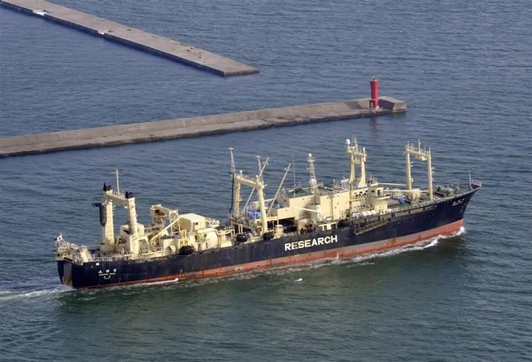 An aerial picture shows the Nisshin Maru, the mother ship of Japan’s whaling fleet, leaving the port of Ishinomaki, Miyagi prefecture, on April 1. (Kazuhiro Nogi/AFP/Getty Images)