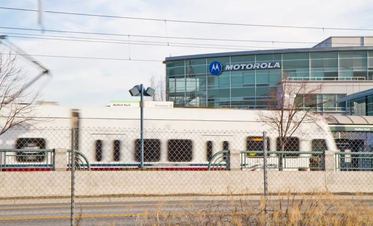 A light rail transit train arrives near Motorola Mobility's Silicon Valley office, part of the Moffett Towers campus, on Feb. 3. Motorola recently scored a huge second round legal win against Apple in Germany on a patent case involving Apple's iCloud service. (Jan Jekielek/The Epoch Times)