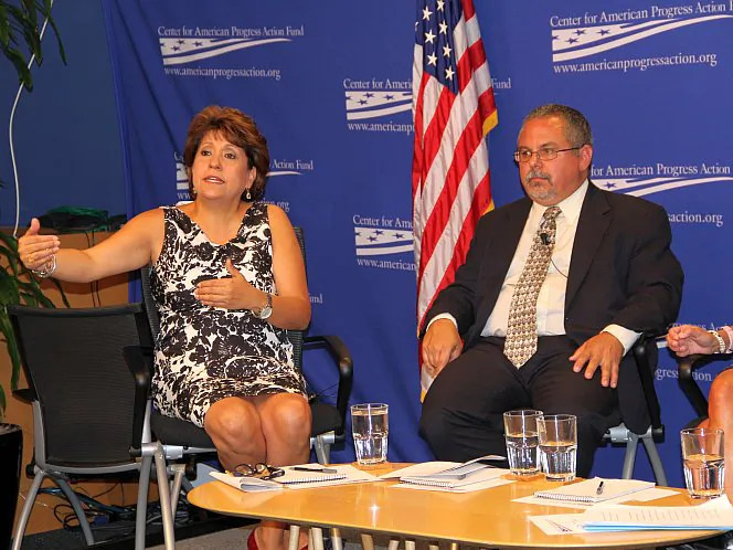 Janet Murguía (L), president and CEO of the National Council of La Raza, and Gary Segura, professor of political science and co-founder of Latino Decisions, speak at a forum at the Center of American Progress in Washington, D.C., on July 19. (Shar Adams/The Epoch Times)