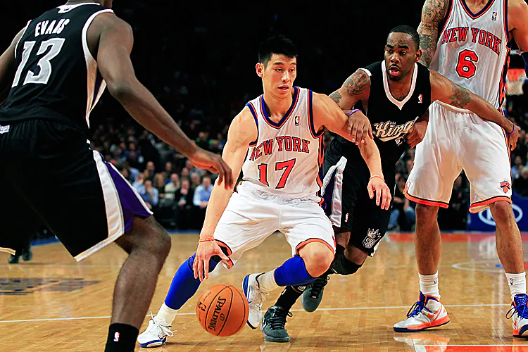 Jeremy Lin (17) hasn’t even been a star for two weeks, but he’s made a huge impact already. (Chris Trotman/Getty Images)
