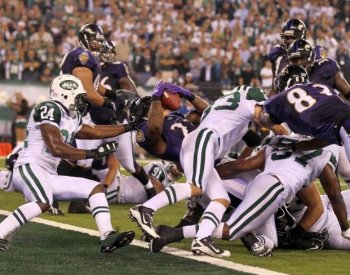 Baltimore's Willis McGahee scores the game's only touchdown. (Jim McIsaac/Getty Images Tags)