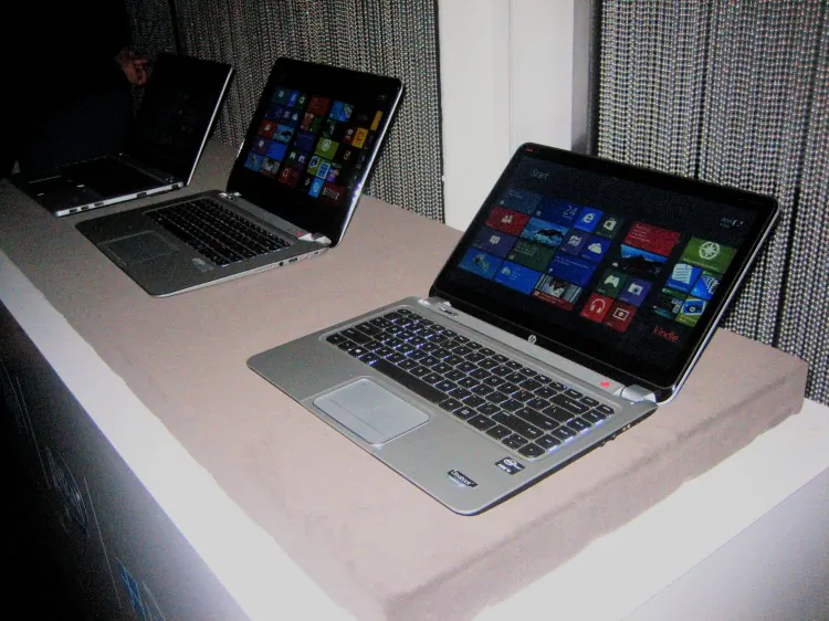 HP ENVY x2 hybrid notebook-tablets are on display during an HP event in New York City on Oct. 24. (Joshua Philipp/The Epoch Times)