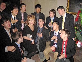 Joy Behar is serenaded by a boy's choir at The White House holiday cocktail party for the press, held on Dec. 11. (Photo courtesy of Joy Behar) Joy Behar is serenaded by a boy's choir at The White House holiday cocktail party for the press, held on Dec. 11. (Photo courtesy of Joy Behar)