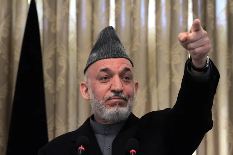 On Monday, Afghan President Hamid Karzai, seen here at a press conference in Kabul on Feb. 8, 2011, ascribed blame for a wave of militant attacks the day before on poor NATO intelligence. (Majid Saeedi/Getty Images)