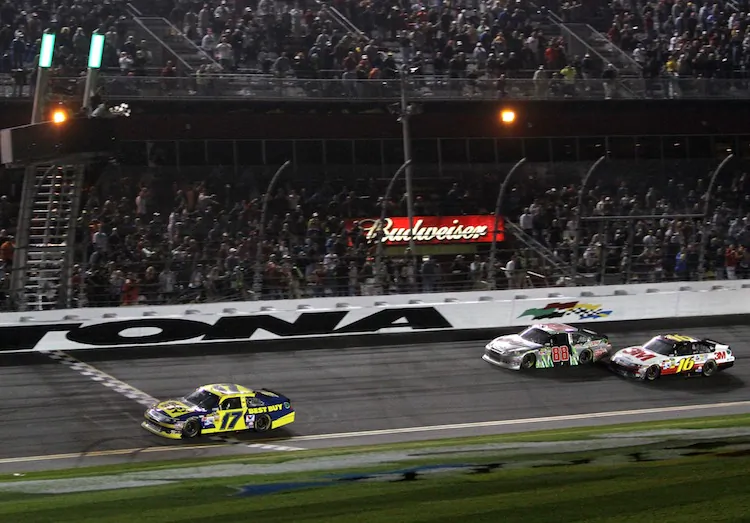 Matt Kenseth, driver of the 17 Best Buy Ford, crosses the finish line to win the NASCAR Sprint Cup Series Daytona 500 at Daytona International Speedway. (Jerry Markland/Getty Images for NASCAR)
