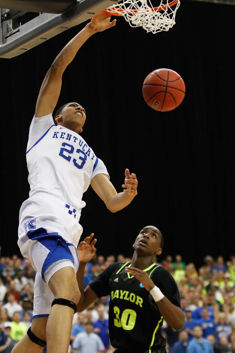 Anthony Davis (L) scored 18 points, grabbed 11 rebounds, and blocked 6 shots as Kentucky advances to their second straight Final Four. (Streeter Lecka/Getty Images)