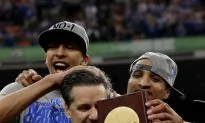Kentucky Tops Kansas 67–59 to Win Title