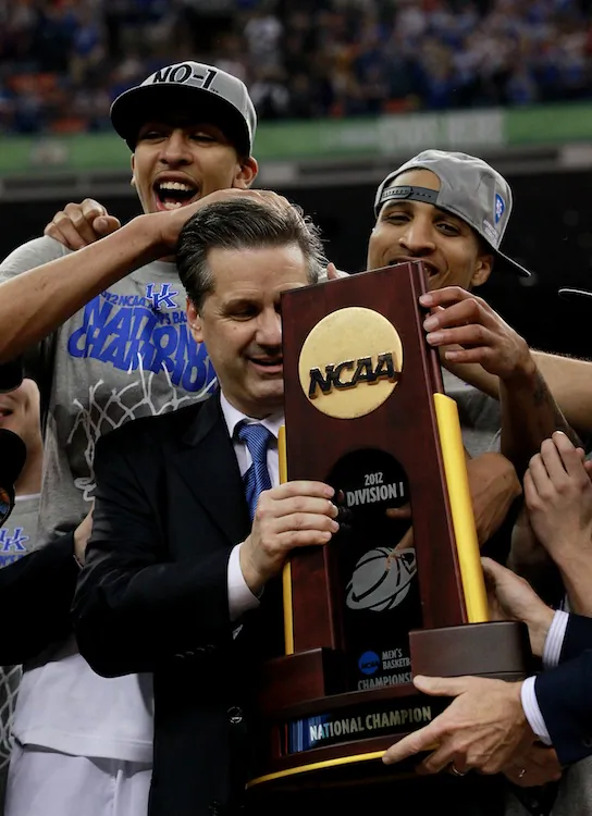 Kentucky head coach John Calipari (C) won his first National Championship Monday night at the Final Four. (Ronald Martinez/Getty Images)