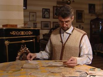 Kirill Novosselski examines old family postcards in Moscow Gliere's memorial appartment, May 2009. (Courtesy of Kirill Novosselski) Kirill Novosselski examines old family postcards in Moscow Gliere's memorial appartment, May 2009. (Courtesy of Kirill Novosselski)