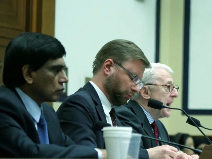 Suzanne Scholte, President, Defense Forum Foundation, gives testimony before the Congressional-Executive Commission on China on the urgent crisis facing North Korean refugees recently arrested in China. In the background, Songhwa Han, former North Korean refugee detained in China, repatriated to North Korea, described life in the prison. Both spoke on Capitol Hill, March 5. (Gary Feuerberg/The Epoch Times)