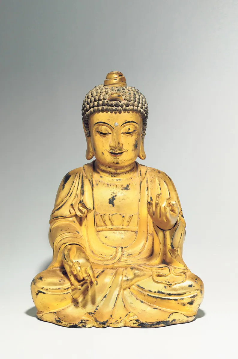 A gilt-wood seated figure of Amitabha Buddha, Korean Joseon Dynasty, circa 1900. Estimate: $12,000-$15,000 (Courtesy of Christies)