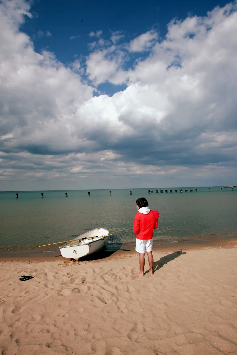 Lake Michigan has been steadily shrinking since 1997, and many life forms—including humans—have been forced to adjust to the changing water levels. Scientists believe that if change happens gradually enough, even at-risk ecosystems will have time to adjust. (Scott Olson/Getty Images)
