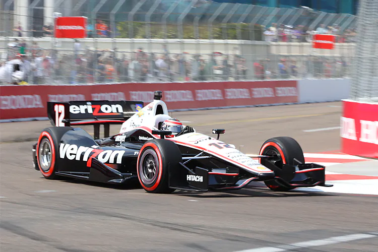 Will Power accepts the Verizon Pole Award. (James Fish/The Epoch Times
