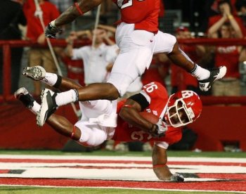 SPECIAL TEAMS HERO: Rutgers' Joe Lefeged (No. 26) shown here on Sept. 2 against Norfolk is an expert at blocking punts. He blocked two more against FIU on Sunday (Andrew Burton/Getty Images)