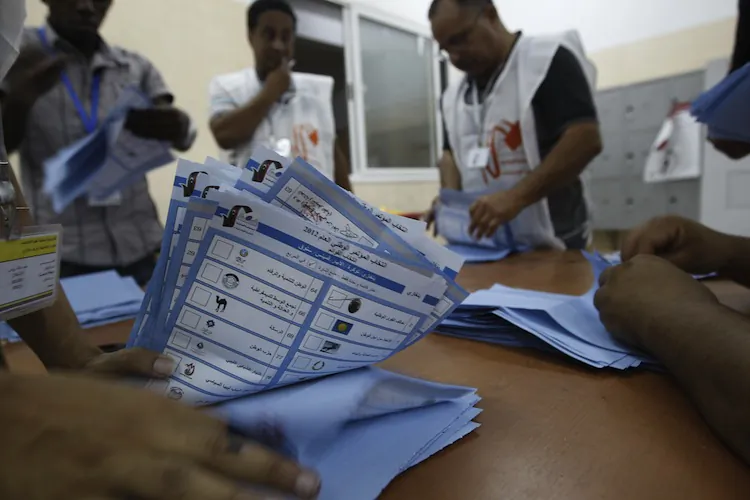 Libyans count votes at a polling station in the eastern city of Benghazi during Libya's General National Assembly election on July 7. Eager voters cast ballots on July 7 in Libya's first free national elections for decades. (Mohammed Abed/AFP/GettyImages)