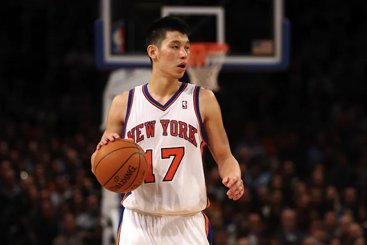 Jeremy Lin became the first player in NBA history to put up at least 20 points and 7 assists in his first 4 starts. (Chris Chambers/Getty Images)