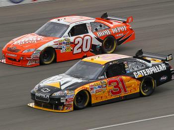 Jeff Burton, in the #31 Caterpillar Chevrolet, leads Joey Logano, in the #20 The Home Depot Toyota, during the NASCAR Sprint Cup Series Auto Club 500. (Stephen Dunn/Getty Images for NASCAR) Jeff Burton, in the #31 Caterpillar Chevrolet, leads Joey Logano, in the #20 The Home Depot Toyota, during the NASCAR Sprint Cup Series Auto Club 500. (Stephen Dunn/Getty Images for NASCAR)