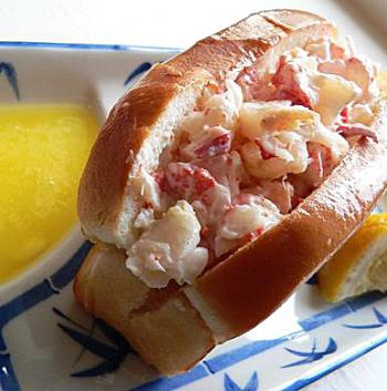 LOBSTER ROLL: A new England specialty. Purists shun lettuce, baguettes, and condiments and go straight for lobster salad on a New England style hotdog bun. (Courtesy of Timeless Gourmet)