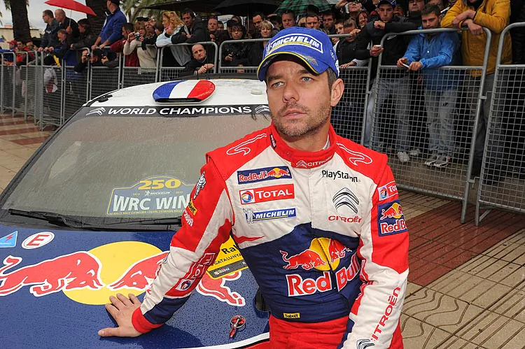 Sebastien Loeb waits in the final service area during Day Three of the WRC round in Spain on November 11, 2012 in Salou, Spain. Loeb won the 18-stage event. (Massimo Bettiol/Getty Images)