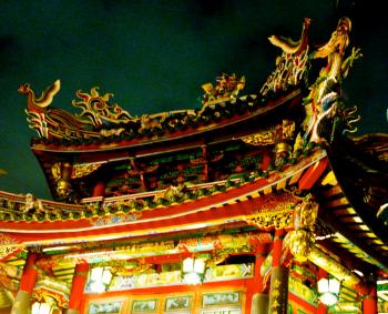 The famous Longshan Temple showcases ornate temple carvings and paintings with intricate designs like the dragons on the roof. (Courtesy of Weronika Czapla) The famous Longshan Temple showcases ornate temple carvings and paintings with intricate designs like the dragons on the roof. (Courtesy of Weronika Czapla)