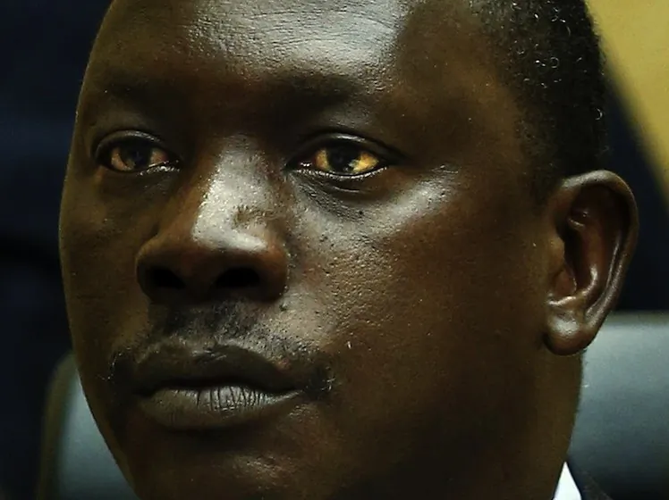 Congolese warlord Thomas Lubanga listens as The International Criminal Court (ICC) sentences him in the Hague, on July 10, its first-ever sentencing. (Jerry Lampen/AFP/GettyImages)
