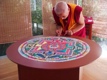 Tibetan artist Dorjee Sangpo creates a mandala over the course of eight days. (Suzi Loo/The Epoch Times)